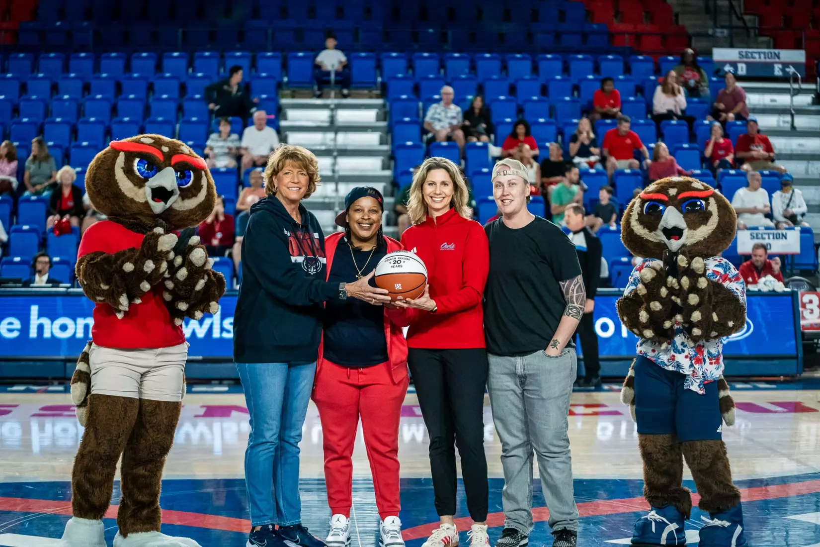 Coach Chancellor Dugan, Sharia Young, Coach Freeland, Amanda Bulin during pregame ceremony