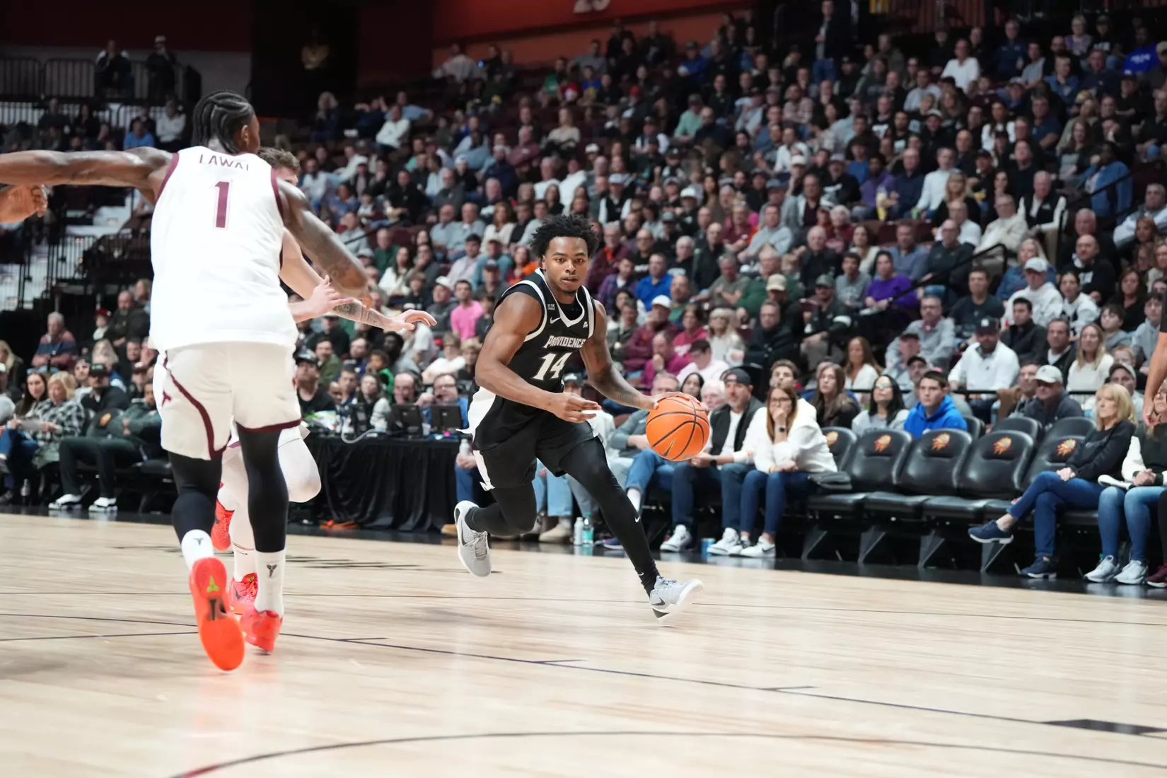 Corey Floyd Jr. drives to the hoop against Virginia Tech at Mohegan Sun on Nov. 8. 