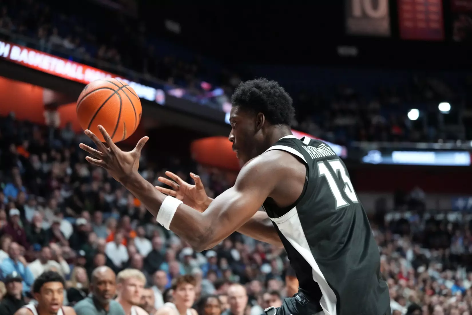 Cole Hargrove secures a rebound against Virginia Tech at Mohegan Sun on Nov. 8. 