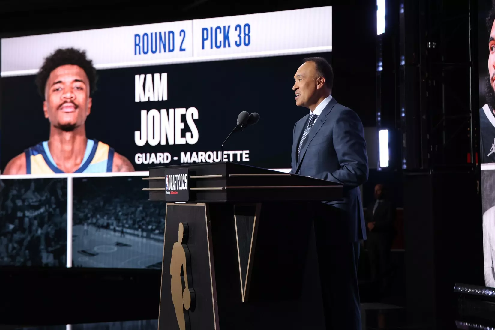 BROOKLYN, NY - JUNE 26:   NBA Deputy Commissioner Mark Tatum announces Kam Jones getting drafted thirty eighth overall  during the 2025 NBA Draft - Round Two on June 26, 2025 at Barclays Center in Brooklyn, New York. NOTE TO USER: User expressly acknowledges and agrees that, by downloading and or using this photograph, User is consenting to the terms and conditions of the Getty Images License Agreement. Mandatory Copyright Notice: Copyright 2025 NBAE (Photo by  Jeff Haynes/NBAE via Getty Images)