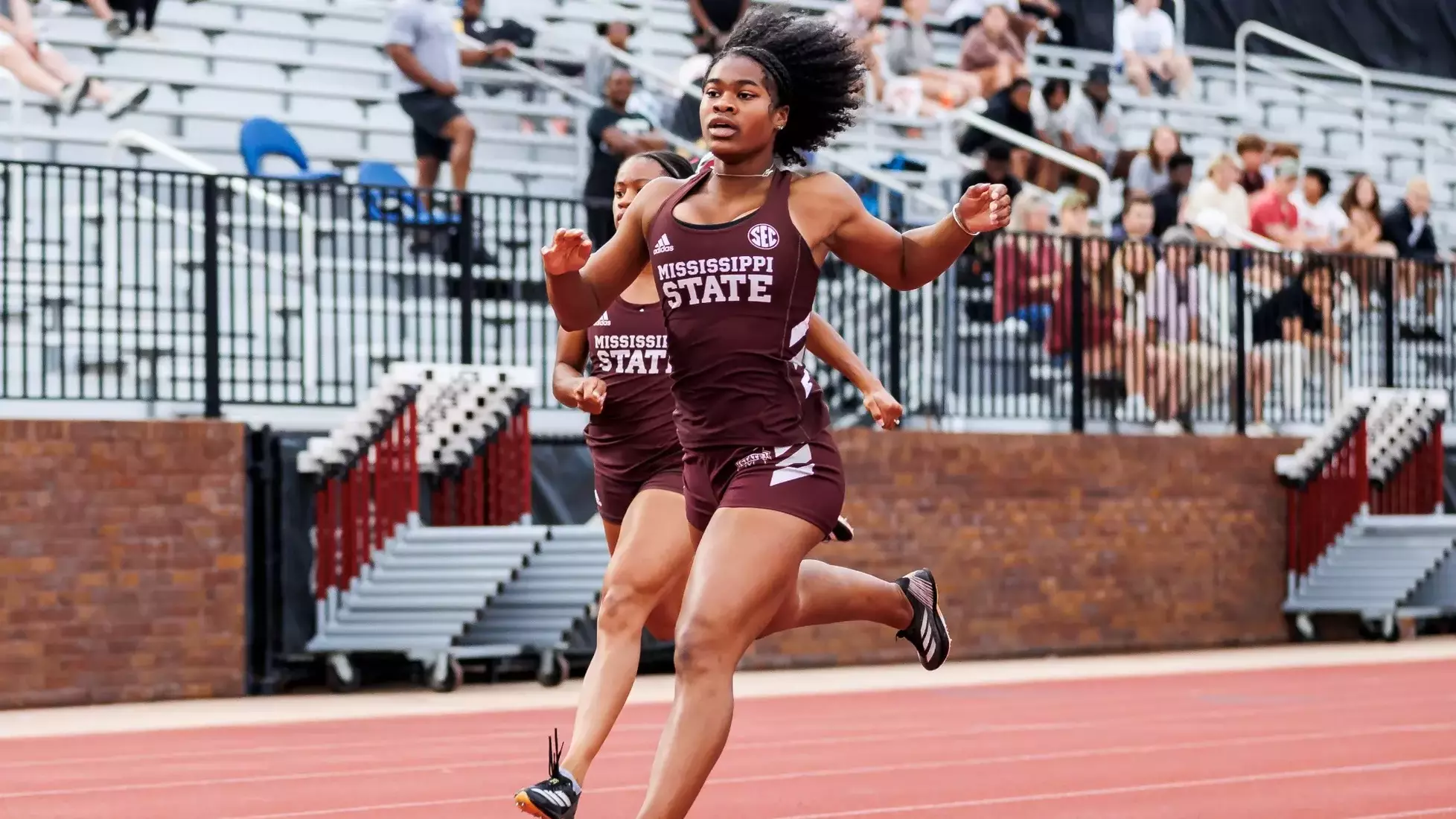 STARKVILLE, MS - May 02, 2025 - Mississippi State Sprinter Chanice Spicer and Mississippi State Sprinter Jaden Billings during the Maroon and White Tune Up at the Mike Sanders Track Complex in Starkville, MS. Photo By Hallie Walker