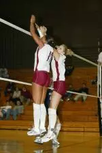 Morgan Woodcock and Allison Anderson jump the net to block a Villanova attack back in October.