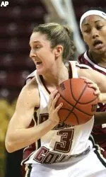 Sarah Marshall looks to pass as she is pressured by Fordham guard Jade Leitao during the first half.