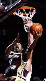 Jermaine Watson gets past Massachusetts' Jeff Salovski during the second half.