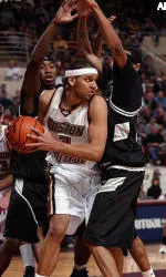 Jared Dudley looks to pass as he is surrounded by Providence's Herbert Hill and Dwight Brewington during the second half.
