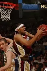 Jared Dudley grabs a rebound away from Notre Dame guard Colin Falls during first half.