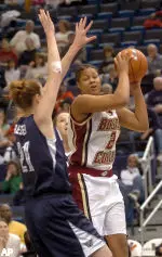 Brooke Queenan loooks for an opening as Villanova's Jana Rediger guards her in the first half.