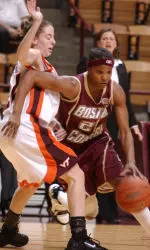 Aja Parham (right) drives against Virginia Tech's Carie Mason. (AP Photo)