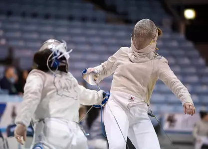North Carolina's Clara Somfelean and Boston College's Gillian Lawlor compete with the saber during the 2018 ACC Fencing Championships in Chapel Hill, N.C., Saturday, February 24, 2018. (Photo by Liz Condo, theACC.com)