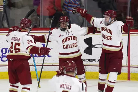 Greco celebrates a goal against UVM