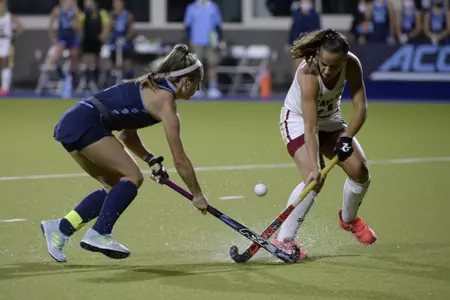 Boston College Juliette Hijdra (14) and North Carolina Erin Matson (1) battle for the ball during the quarterfinals of 2020 ACC Field Hockey Championship in Cary, N.C., Thursday, Nov.5, 2020. (Photo by Sara D. Davis, the ACC)