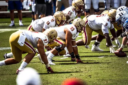 The defensive line anticipates the snap at Duke (Sept. 19, 2020).