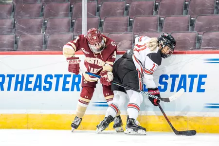 Jillian Fey battles for the puck against Ohio State.