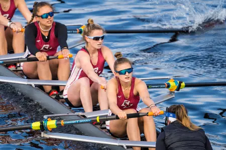 The Eagles in a V8 on the Charles River.