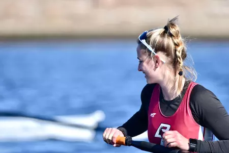 The Eagles get ready to row in the boat at Coast Guard.