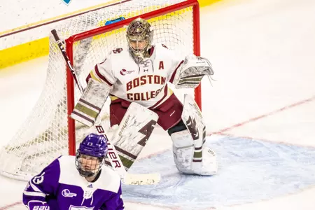 Molly Barrow makes a save against Holy Cross.