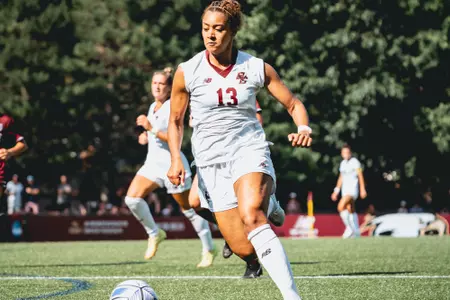 Linda Boama carries the ball up the field against Colgate.