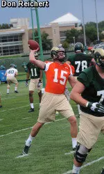 Conner Smith completes a pass on the first day of fall camp.
