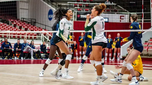 Naeemah Weathers and Malaya Jones celebrate vs. Michigan
