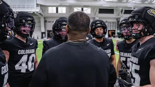 Coach Marv talks to linebackers