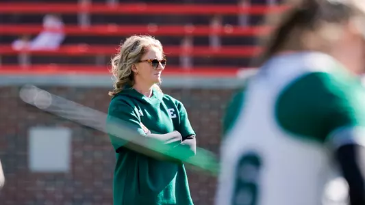 Maddie Dugan coaching in 2025