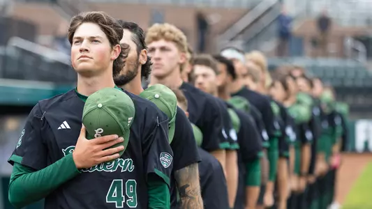 Ethan Davis stands for the National Anthem before facing Michigan State, May 6, 2025
