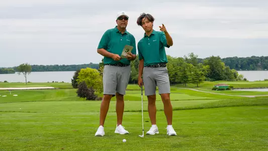 Tim Chan and Andy Walker survey the course ahead of a shot