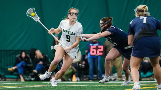 Kelsea Dague carries the ball toward the cage at home against Butler, Feb. 8, 2026.
