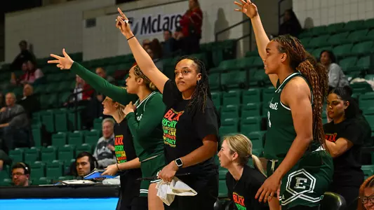 Shareese Ulis celebrates on the bench