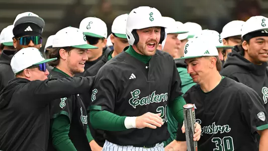 Ty Stecko celebrates in the dugout after scoring a run in the 2025 season