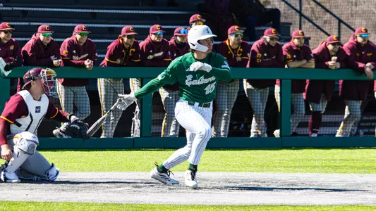 Devan Zirwas starts to run towards first base after getting a hit against Central Michigan at Oestrike Stadium