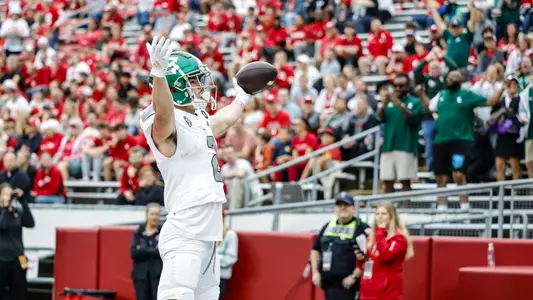 Nick Devereaux celebrates his first-quarter touchdown at Wisconsin, Sept. 19, marking the first offensive touchdown scored against the Badgers in five all-time meetings.
