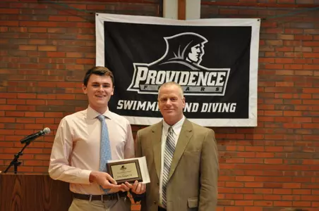 Coach O'Neill presenting John Fatigati with the Horace Bowden Award