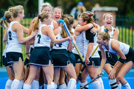 Field Hockey celebration photo after scoring a goal against Quinnipiac