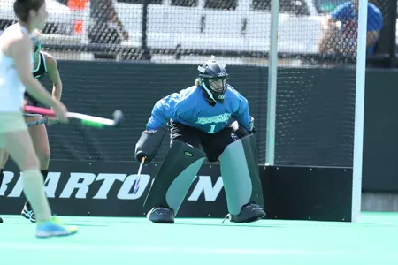 Megan Guilbert defends the goal for the field hockey team during game versus Bryant