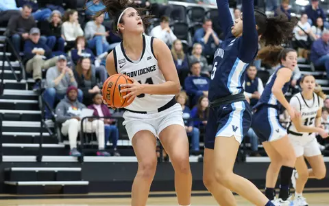 Olivia Olsen faces up against a Villanova defender