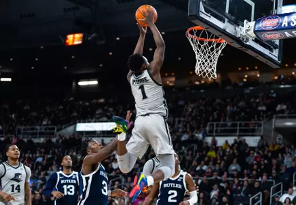 Jayden Pierre - Men's Basketball vs. Butler alley oop at the AMP