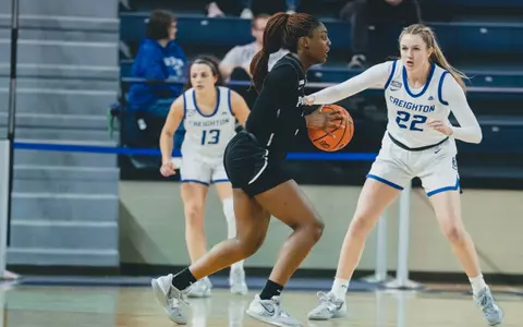 Grace Efosa scans the floor against Creighton
