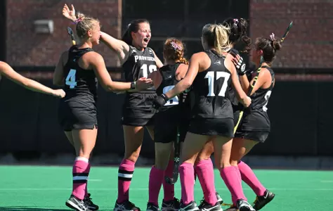 Eleonore de Keyser celebrates after scoring one of her three goals vs. Queens.