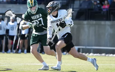 Pierce Gregory plays against Siena defender