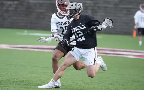 Michael Chabra against Brown defender