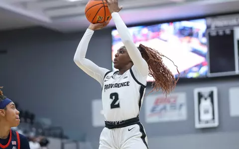 Grace Efosa takes a jump shot against St. John's