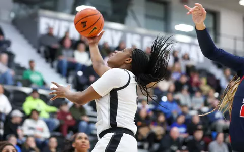 Janai Crooms goes up for a layup
