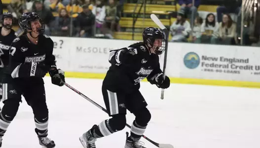 Women's ice hockey player Delaney Couture celebrating a goal against Vermont