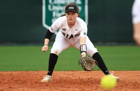 Rachael Petrarca fielding a ball in softball game