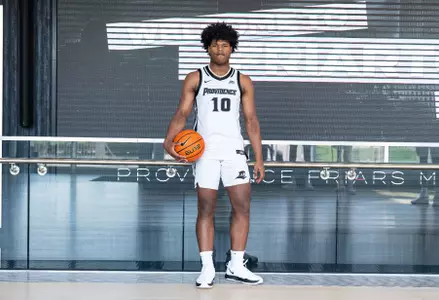 Rich Barron posing in the Friar Development Center. 