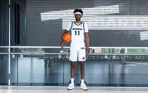 Davonte Gaines posing in the Friar Development Center. 