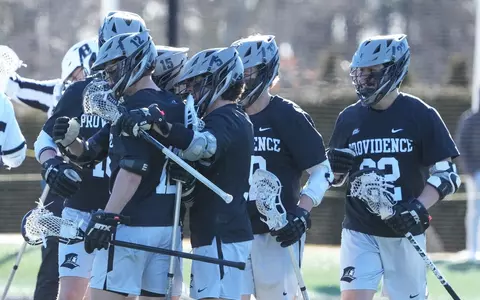 Men's Lacrosse - group huddle