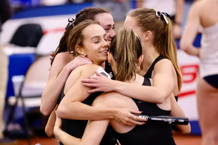 Kimberley May, Halle Atkinson, Tessa Hunt, Jill Fenerty–Women's Track Action Photo