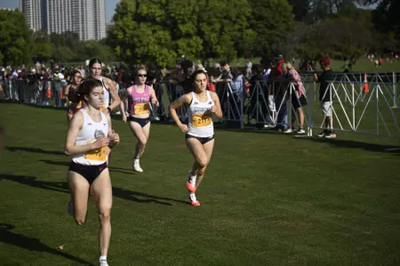 Cross country athlete Jane Buckley running during the Lakeshore Invitational for the Friars.